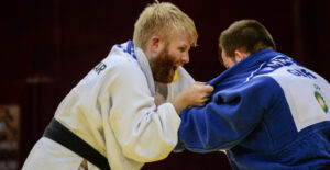 Chris Skelley grips an opponent