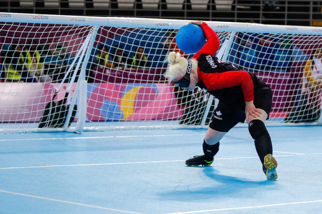 Amy Burk of Canada is pictured in the middle of a powerful throw at the Lima 2019 Parapan American Games