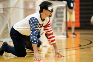Tyler Merren awaits the return of the goalball
