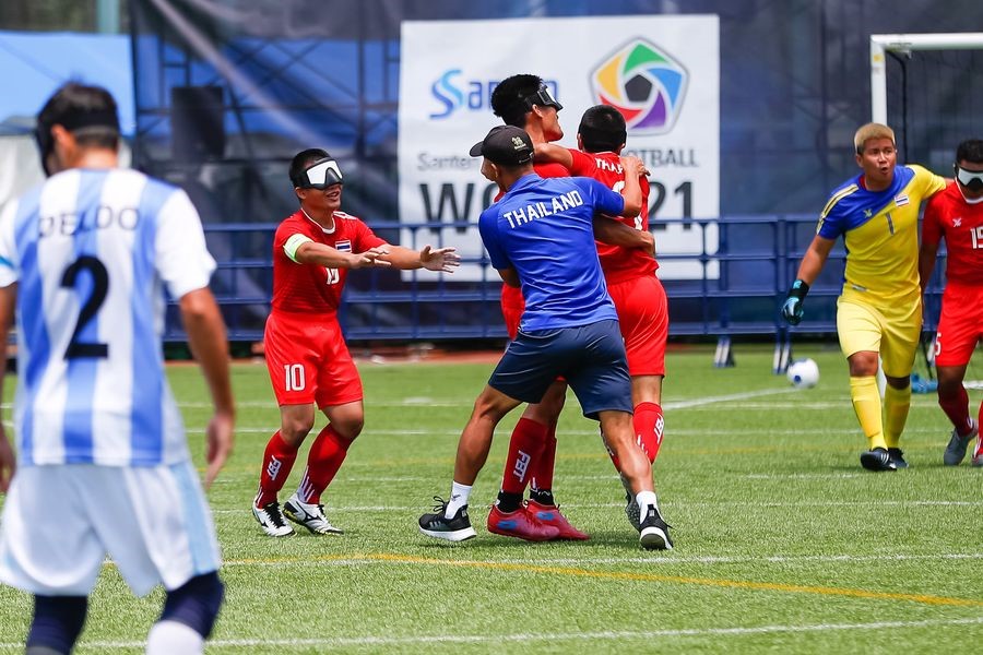 Prakrong Buayai joins his teammates in celebration of a goal against Paralympic bronze medallists Argentina at the 2021 IBSA Blind Football World Grand Prix