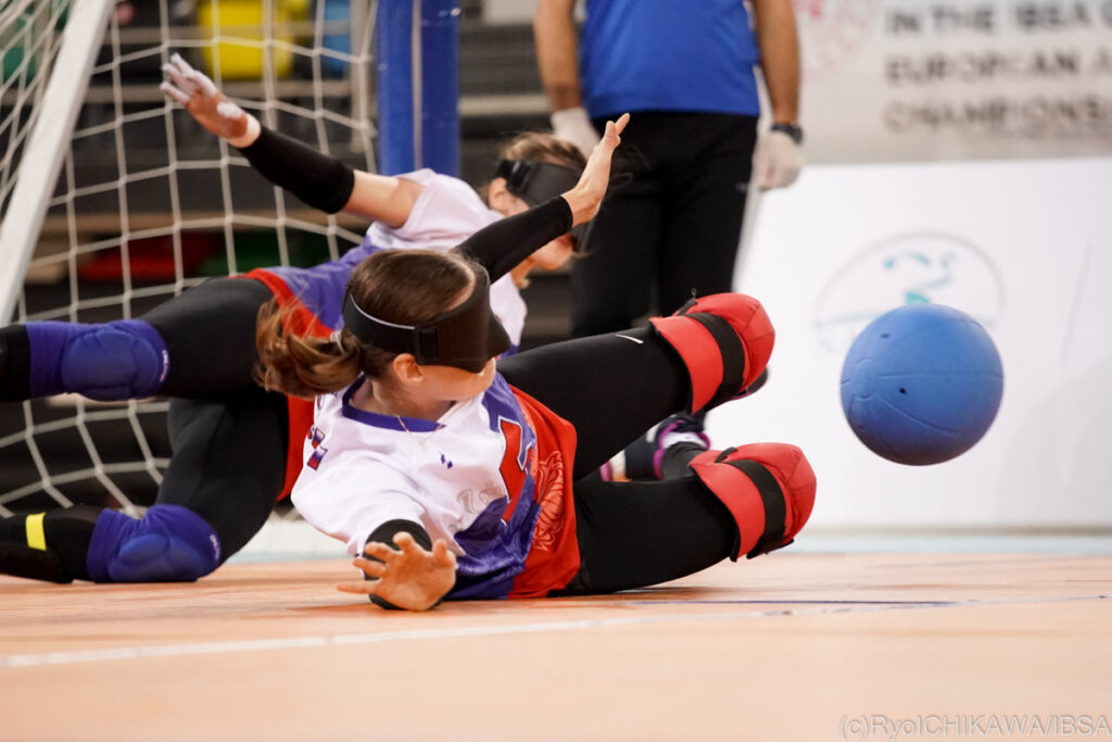 Russian female goalball players make a save